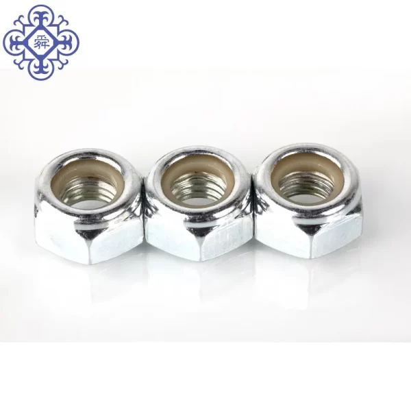 A group of 4.8mm White Zinc Plated Nylon Lock Nut DIN985 and flat washers.